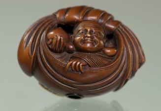 Netsuke of Hotei Seated in his Bag